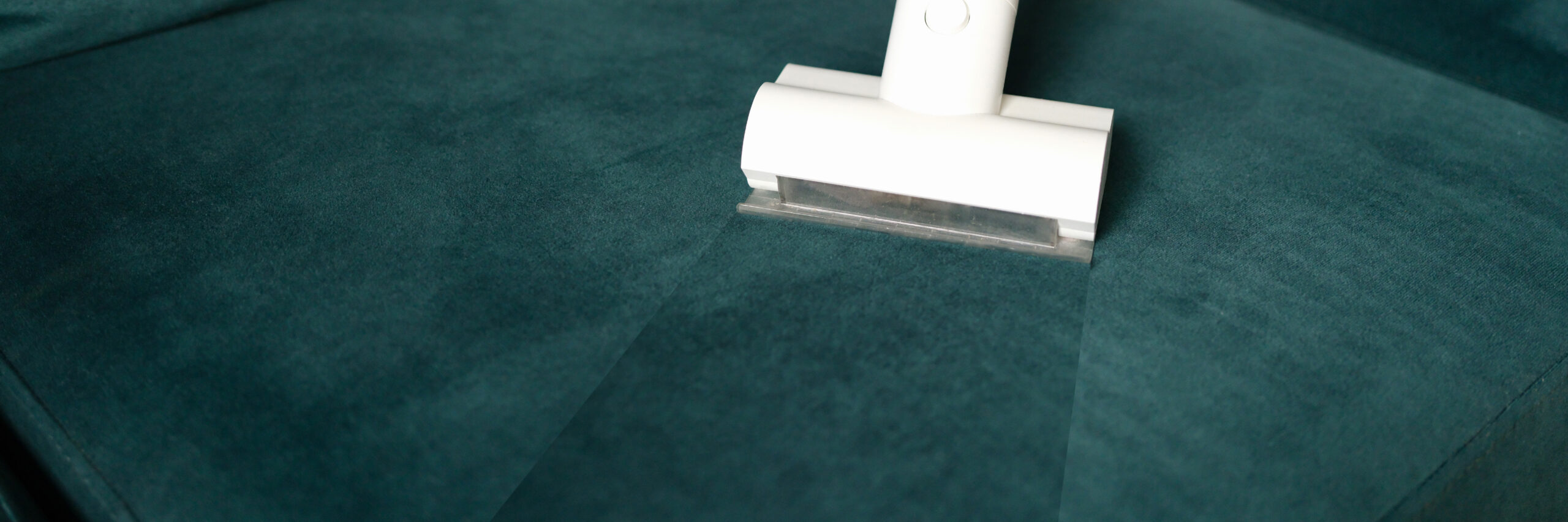Sofa cleaning with vacuum cleaner upholstery service Nagpur